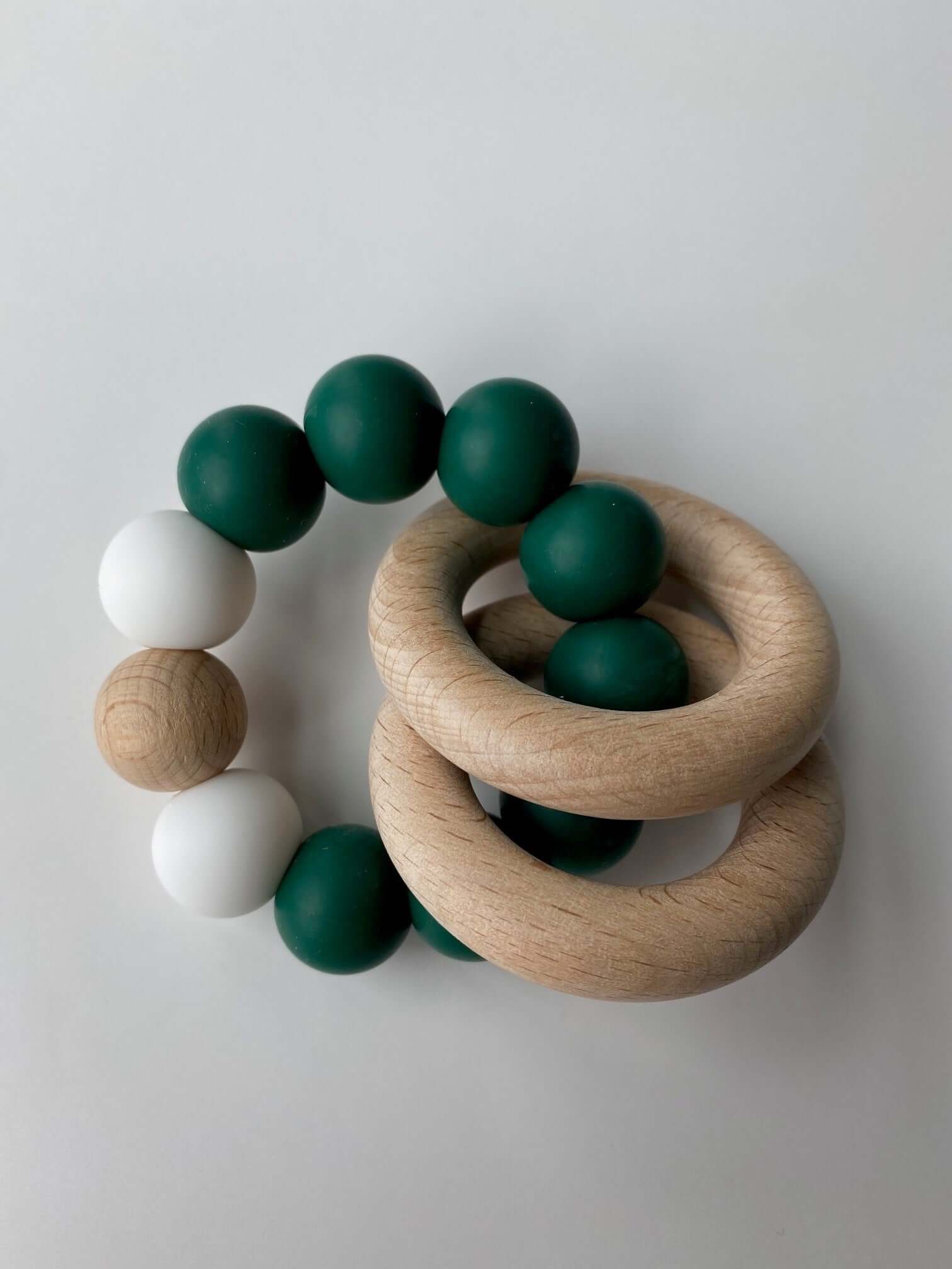 Rattle Teething Ring a 2-in-1 teether and rattle! Rattle Teething Ring a 2-in-1 teether and rattle!
